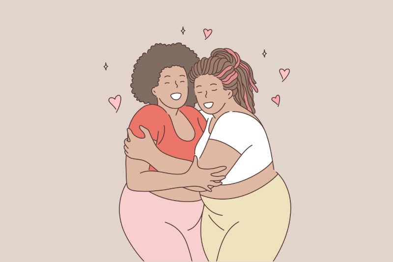 Vektorgrafik von zwei Frauen die sich umarmen und glücklich aussehen