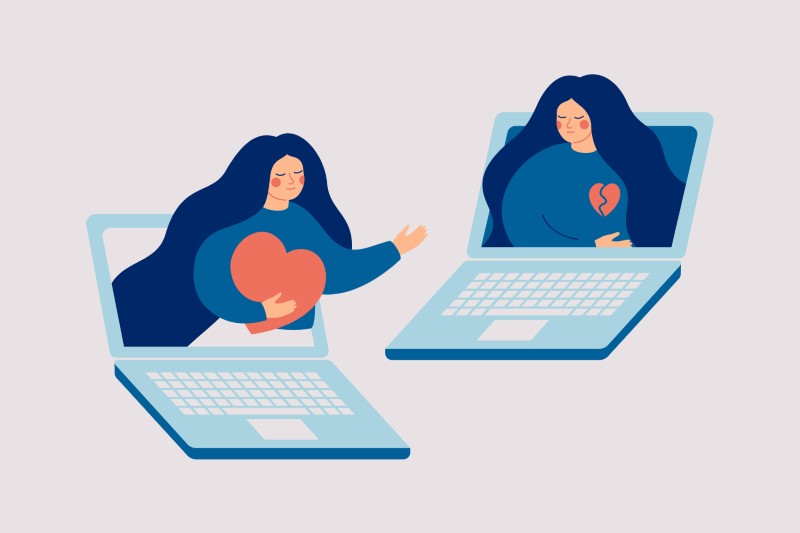 Vektorkunst von zwei Laptops mit zwei Frauen, eine mit einem gebrochenen Herzen und die andere mit einem großen Herzen